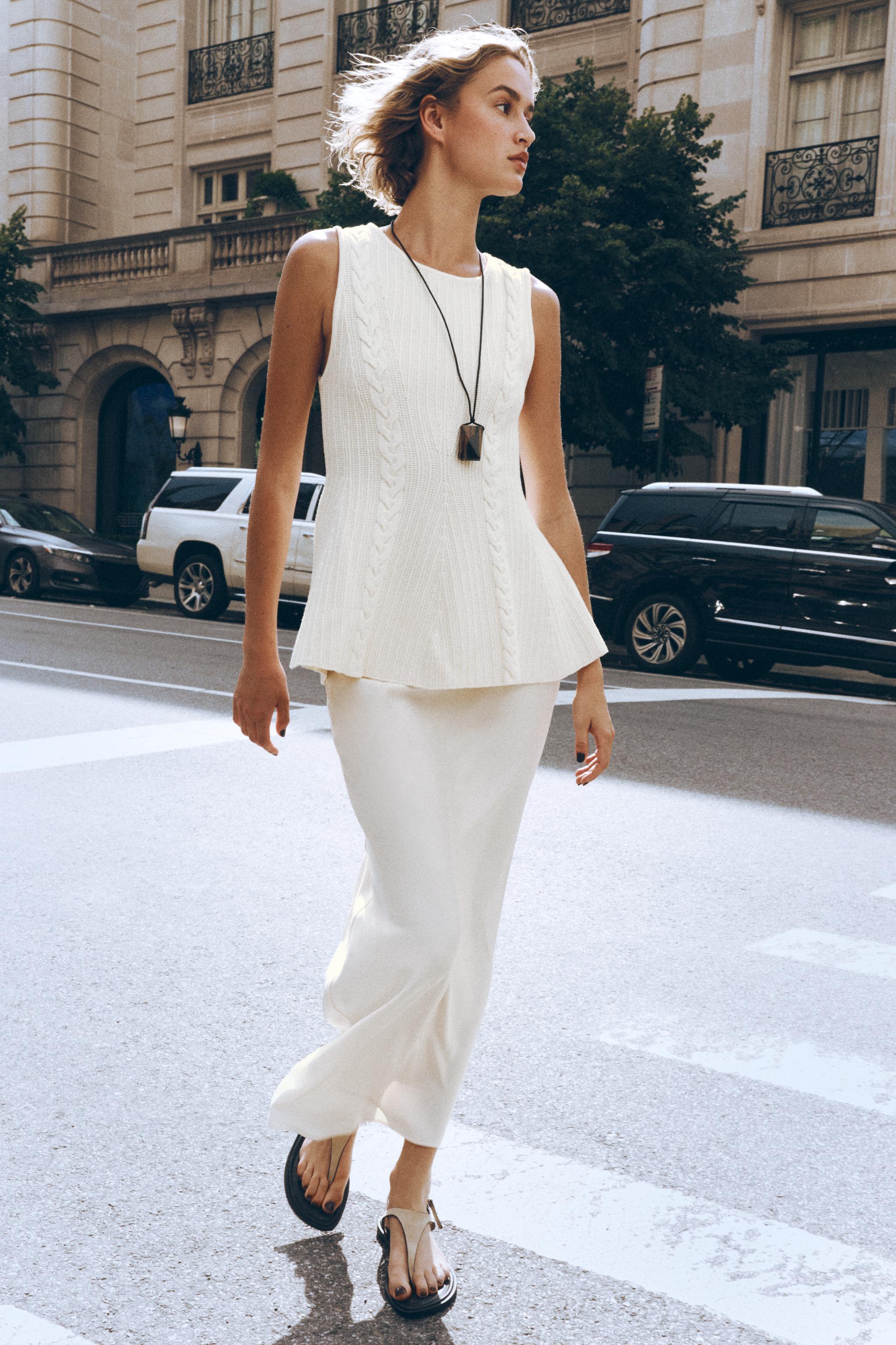 CABLE KNIT PEPLUM TOP
